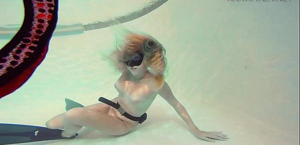  Sophie Murena blonde babe masturbating in the pool